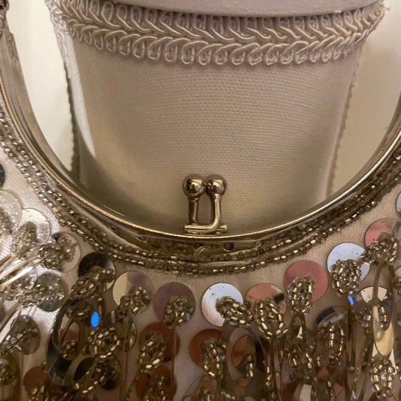 Vintage clutch with metal ring handle and clasp. Many sequined oval adornments. - Picture 2 of 5